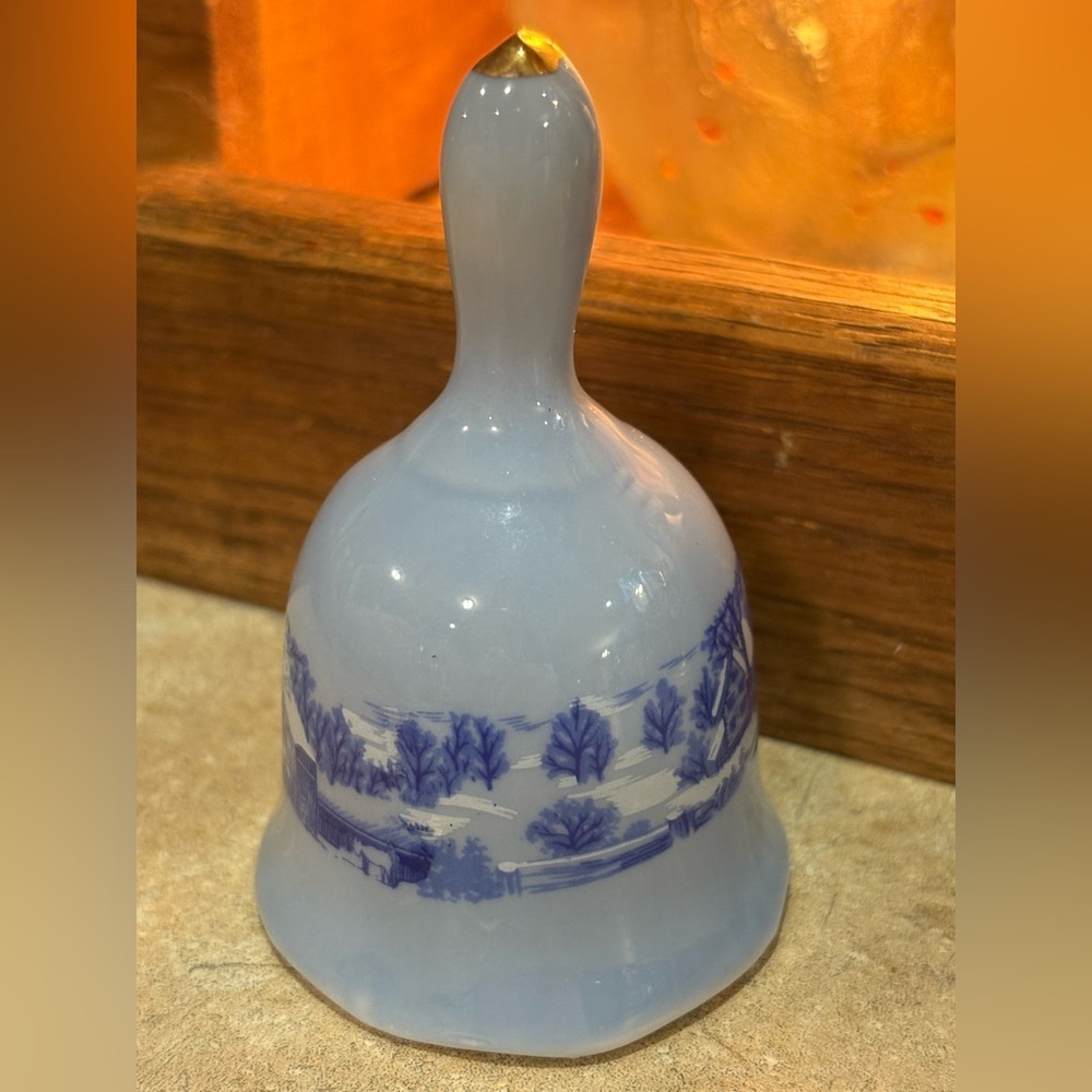 vintage porcelain or ceramic bell, possibly a Currier and Ives. Blue And White